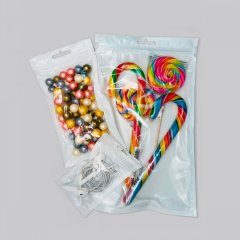 Пакет трехшовные 9*16см, 62 мкм, ПЭТ/ПЭ (бел+прозр), зип-лок, европодвес